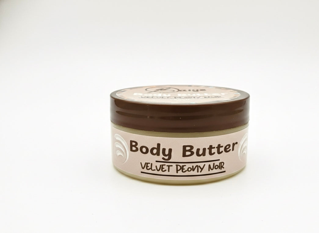 Jar of body butter labeled 'Velvet Peony Noir' on a white background
